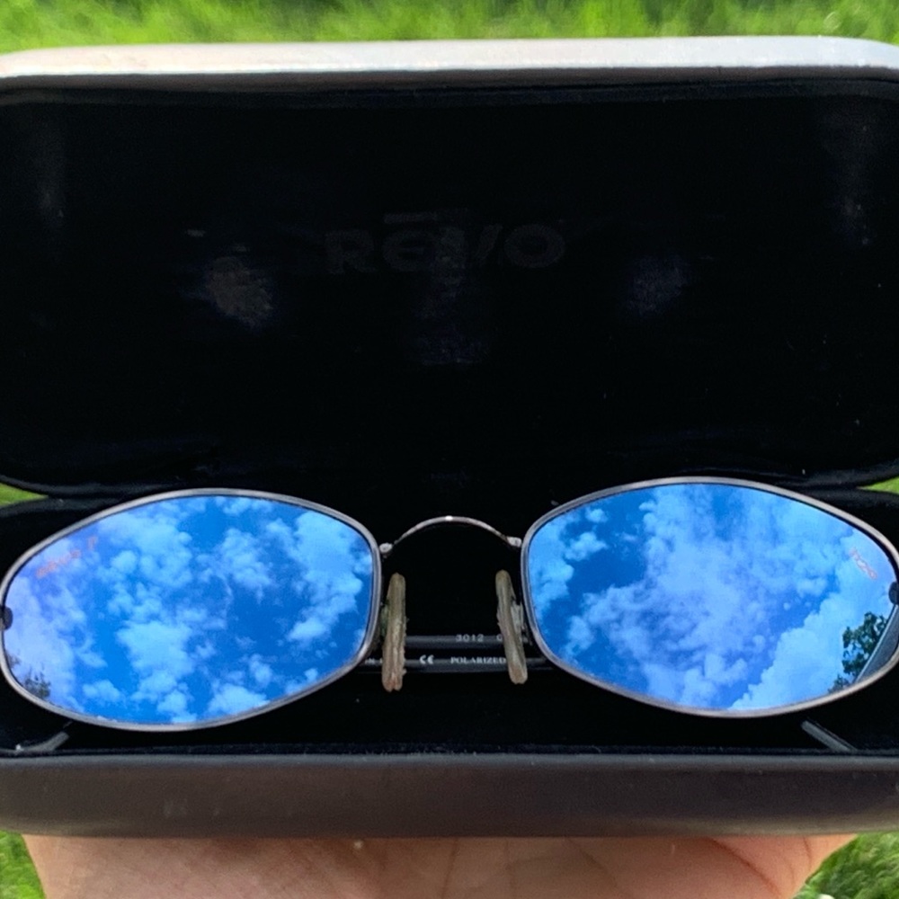 REVO sunglasses. Blue mirror lenses. No scratches. Amazing protection from sun!